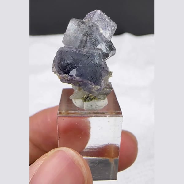Chamfered Fluorite with Bismuthinite Yaogangxian 2.0 cm — detail view