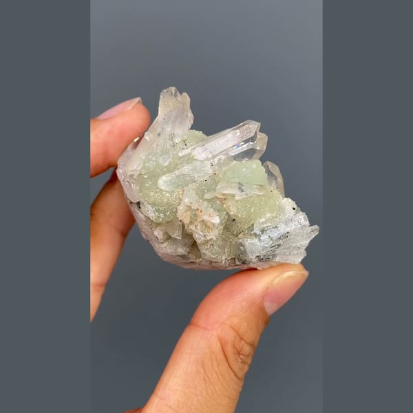 Pale green prehnite with clear quartz crystals from Zhaotong, Yunnan — alternate view