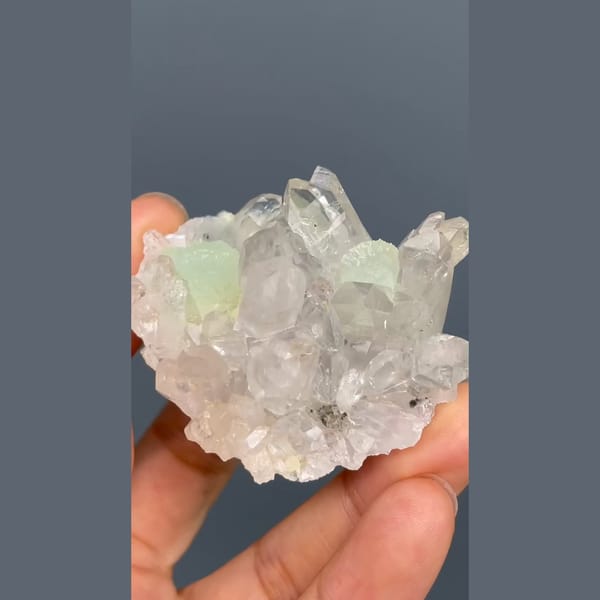 Pale green prehnite with clear quartz crystals from Zhaotong, Yunnan — detail view