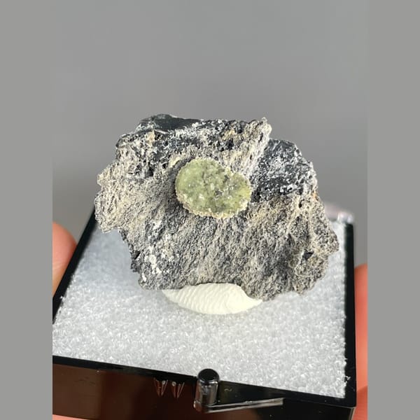 Green radiating wavellite on grey matrix from the USA — alternate view
