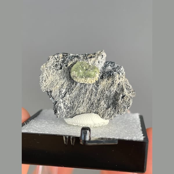 Green radiating wavellite on grey matrix from the USA — detail view