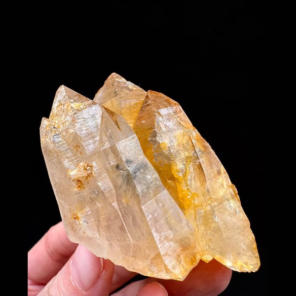 Golden Himalayan quartz cluster with dark inclusions from Ganesh Himal, Nepal — complete view