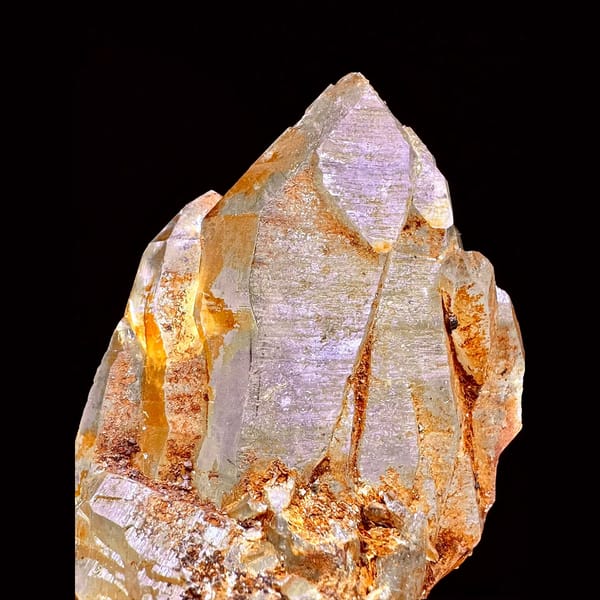 Golden Himalayan quartz cluster with dark inclusions from Ganesh Himal, Nepal — detail view