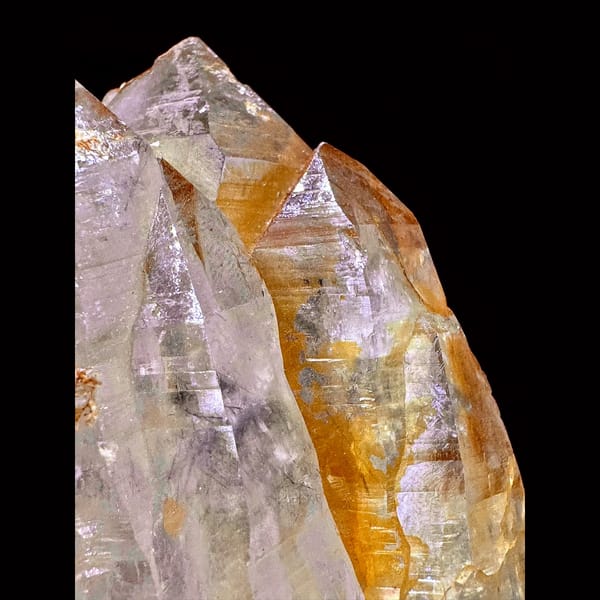 Golden Himalayan quartz cluster with dark inclusions from Ganesh Himal, Nepal — detail view