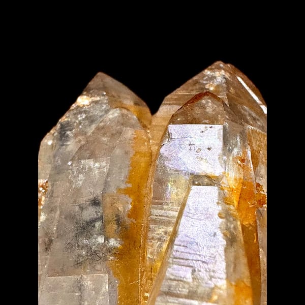 Golden Himalayan quartz cluster with dark inclusions from Ganesh Himal, Nepal — detail view