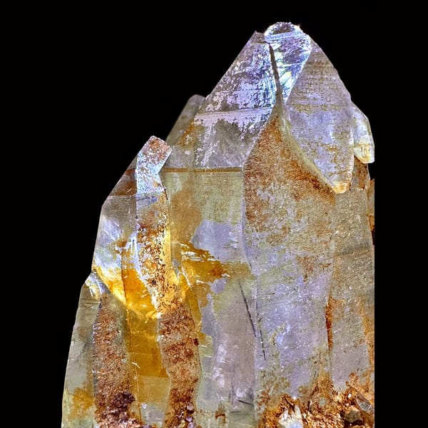 Golden Himalayan quartz cluster with dark inclusions from Ganesh Himal, Nepal — detail view
