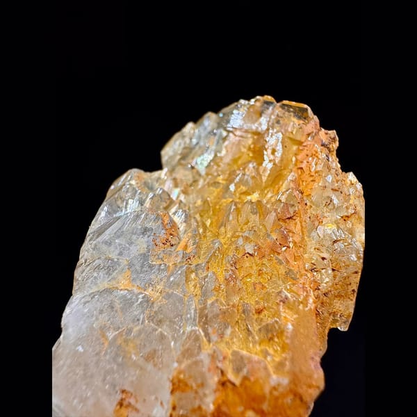 Golden Himalayan quartz cluster with dark inclusions from Ganesh Himal, Nepal — detail view