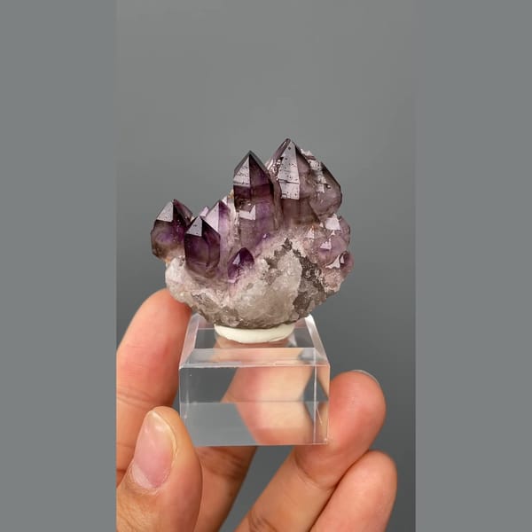 Castle-like cluster of deep purple amethyst points from Namibia — alternate view