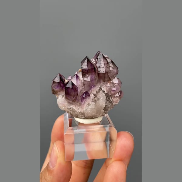 Castle-like cluster of deep purple amethyst points from Namibia — alternate view