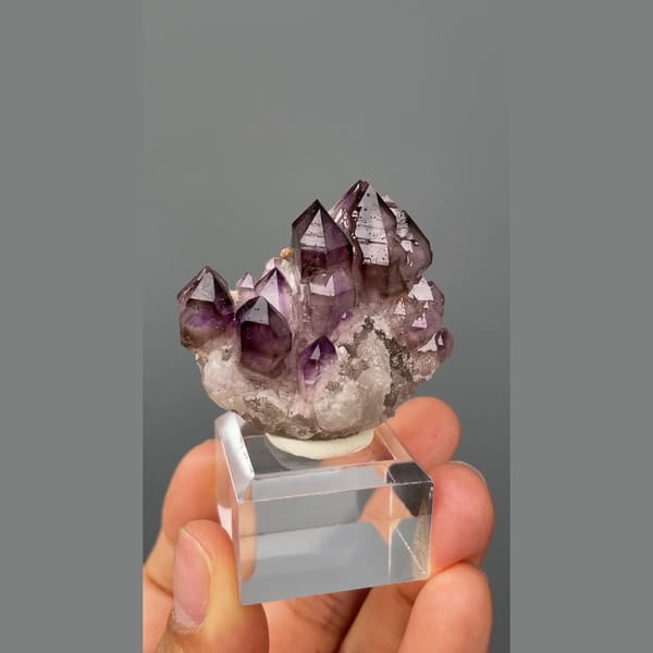 Castle-like cluster of deep purple amethyst points from Namibia — detail view