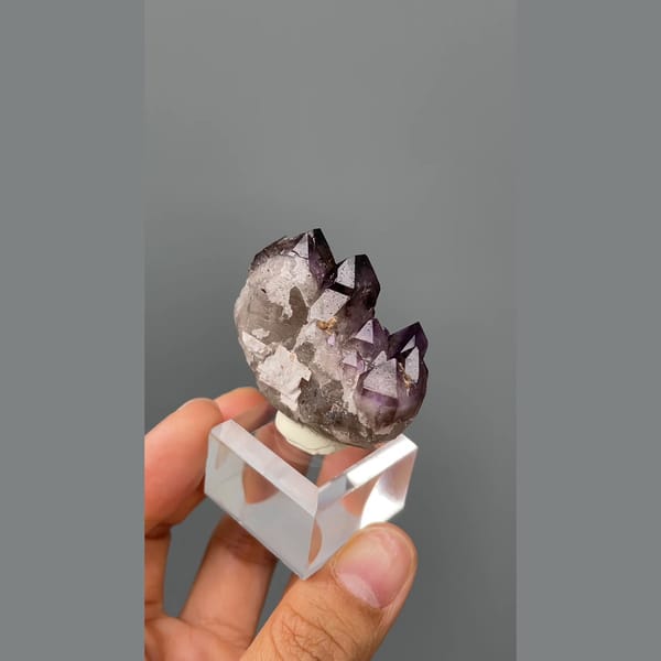 Castle-like cluster of deep purple amethyst points from Namibia — detail view