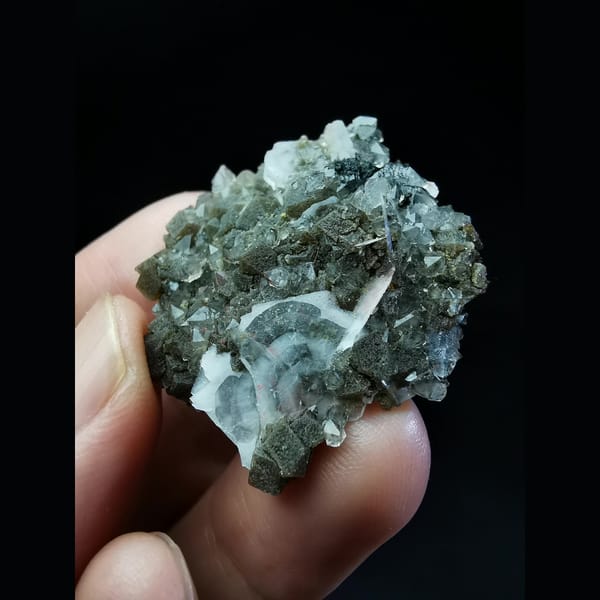 Floater garnet cluster with quartz, calcite and hematite — alternate view