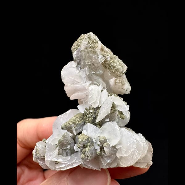 Sparkly quartz floater with white petal calcite from Inner Mongolia — complete view