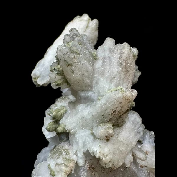 Sparkly quartz floater with white petal calcite from Inner Mongolia — detail view