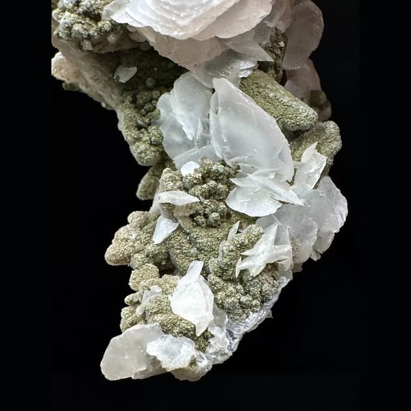 Sparkly quartz floater with white petal calcite from Inner Mongolia — detail view