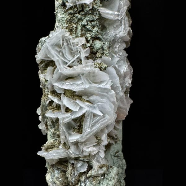Green-skinned quartz floater with petal calcite from Inner Mongolia — detail view