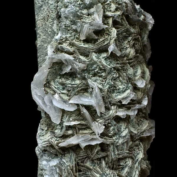 Green-skinned quartz floater with petal calcite from Inner Mongolia — detail view
