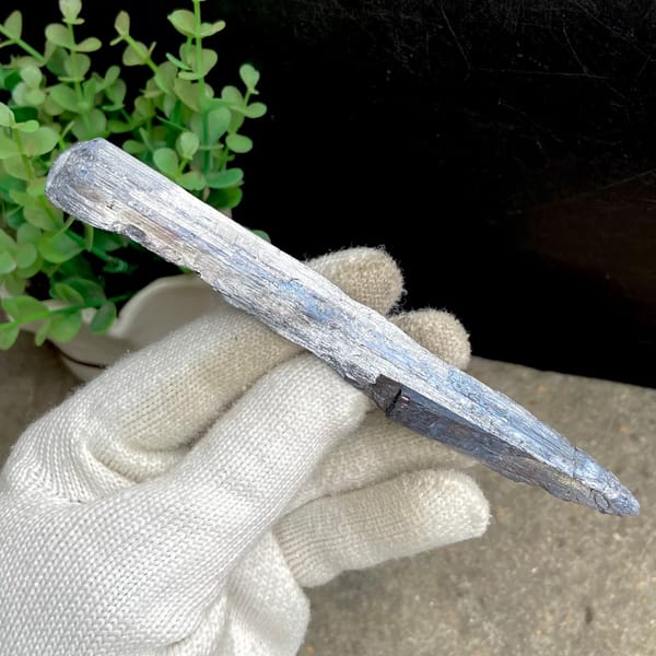 Long steel grey stibnite single crystal — alternate view