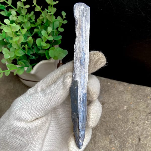 Long steel grey stibnite single crystal — alternate view