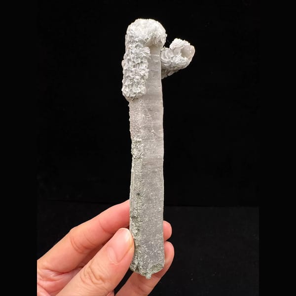 Extra-long sparkly quartz floater with petal calcite from Inner Mongolia — alternate view