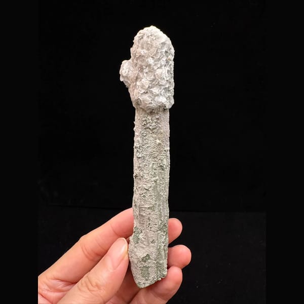 Extra-long sparkly quartz floater with petal calcite from Inner Mongolia — detail view