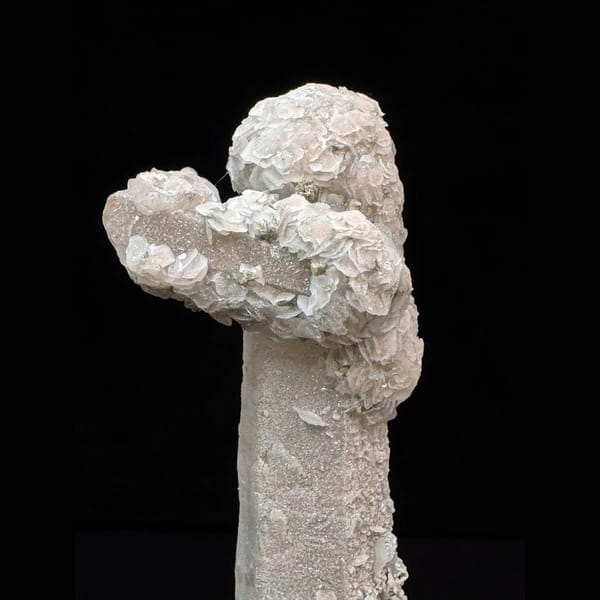 Extra-long sparkly quartz floater with petal calcite from Inner Mongolia — detail view