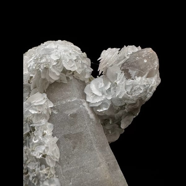 Extra-long sparkly quartz floater with petal calcite from Inner Mongolia — detail view