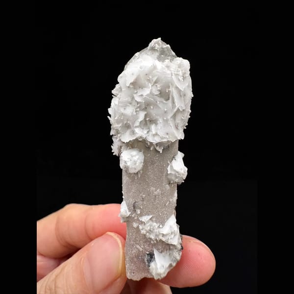 Sparkly quartz point with white petal calcite from Inner Mongolia — complete view