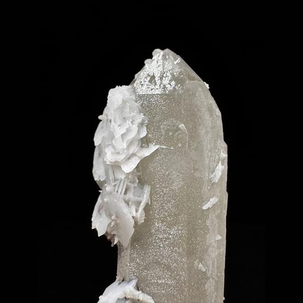 Sparkly quartz point with white petal calcite from Inner Mongolia — detail view
