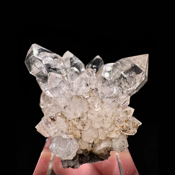 Clear skeletal quartz cluster on matrix from Namibia — alternate view