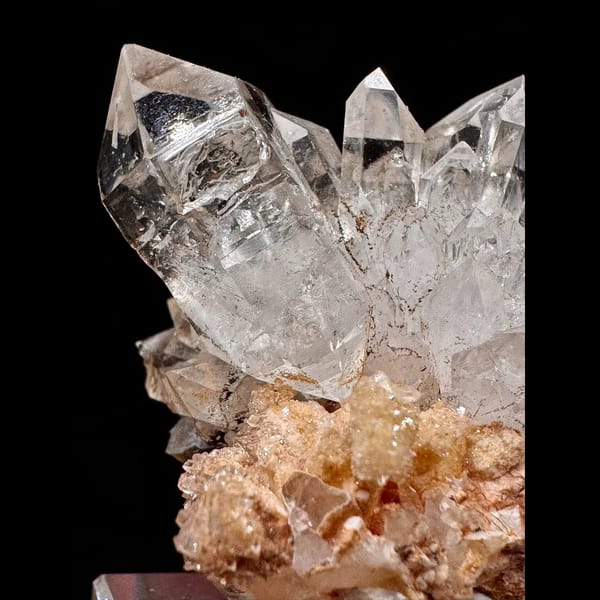 Clear skeletal quartz cluster on matrix from Namibia — detail view