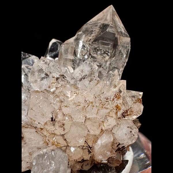 Clear skeletal quartz cluster on matrix from Namibia — detail view