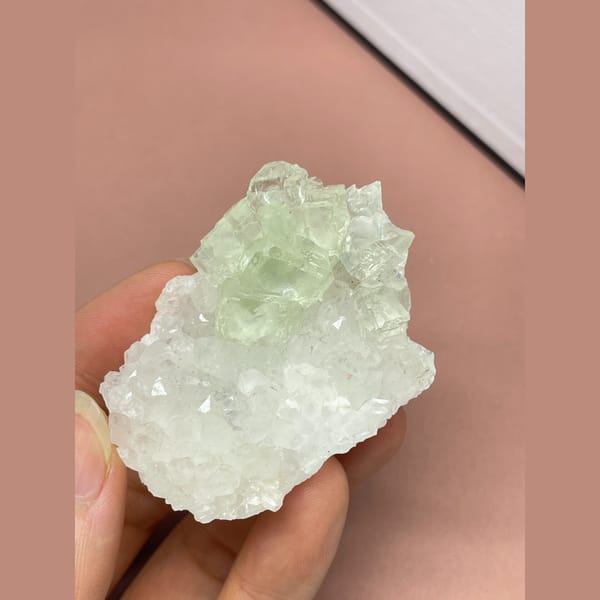 Pale green fluorite on white quartz from Fujian — complete view
