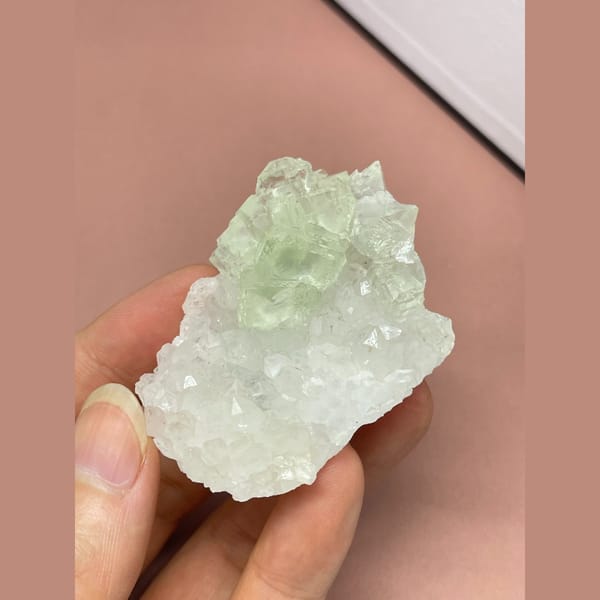 Pale green fluorite on white quartz from Fujian — detail view