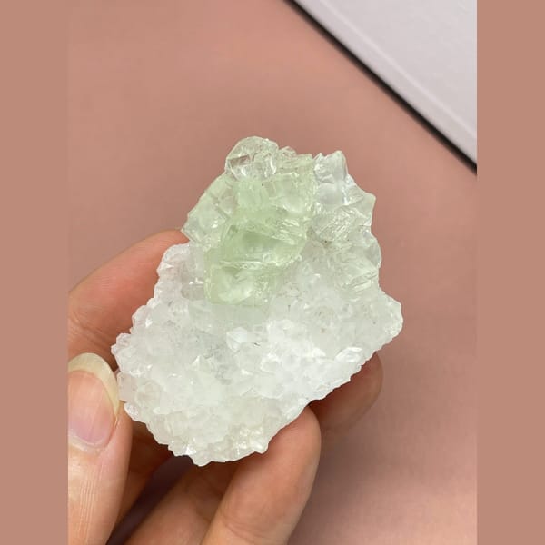 Pale green fluorite on white quartz from Fujian — detail view