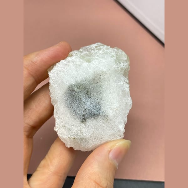 Pale green fluorite on white quartz from Fujian — detail view