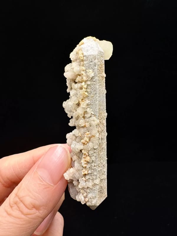 Double-terminated quartz with calcite from Inner Mongolia — complete side view