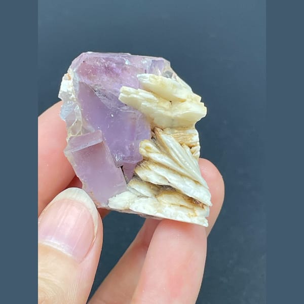 Purple fluorite cube with cream barite blades from Spain — alternate view