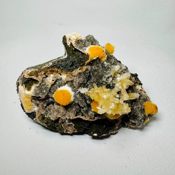 Orange Zeolite Spheres on Basalt India 9.0 cm — complete view