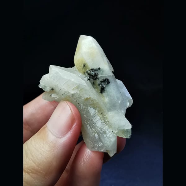 Floater quartz cluster with criss-cross crystals — detail view