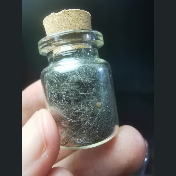 Hair-like Jamesonite Needles in a Glass Vial, natural mineral specimen, photo 2 of 3