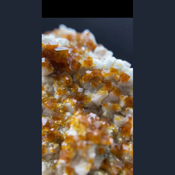 Orange chabazite over white feldspar from Yunxiao, Fujian — alternate view