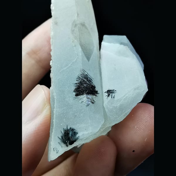 Quartz crystal with calcite and specular hematite — detail view