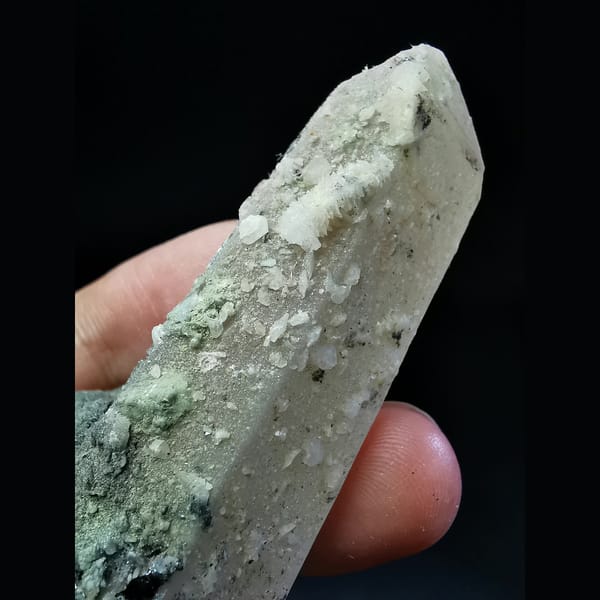 Quartz crystal with calcite and specular hematite — detail view