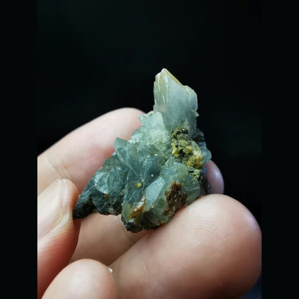 Bladed platy calcite with pyrite and mica — detail view