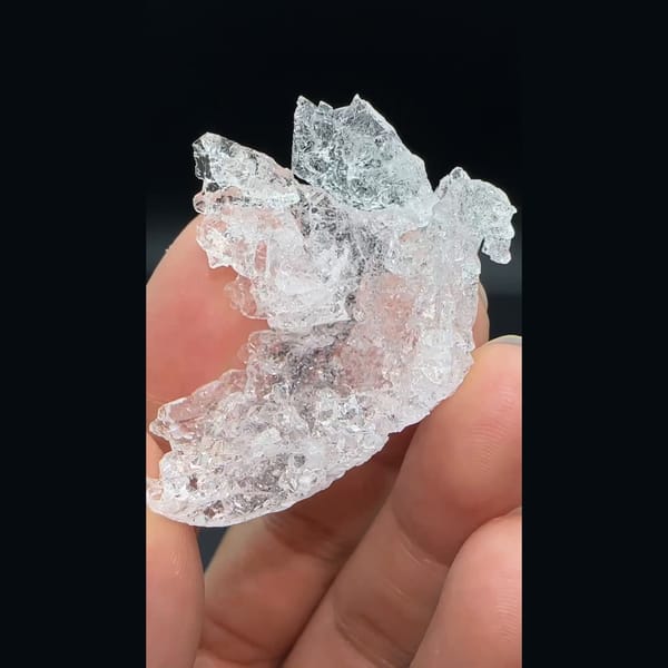 Water-clear deeply etched pollucite crystal from Skardu, Pakistan — complete view