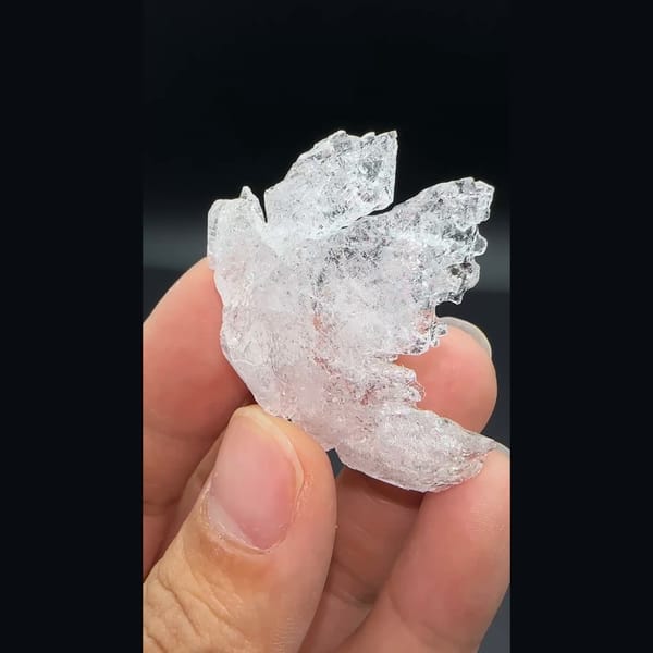 Water-clear deeply etched pollucite crystal from Skardu, Pakistan — alternate view