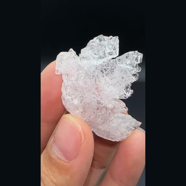 Water-clear deeply etched pollucite crystal from Skardu, Pakistan — alternate view