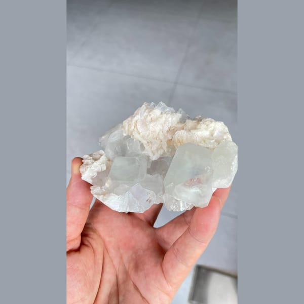Pale green fluorite cubes with white dolomite from Hunan — detail view