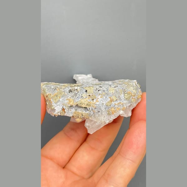 Frosted white quartz tower with pyrite from Shangbao, Hunan — detail view